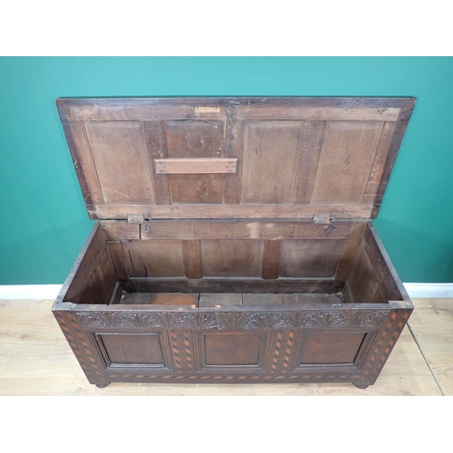 690 - A late 17th Century Halifax style Coffer with chequered inlay, carved frieze and panelled top on lat... 