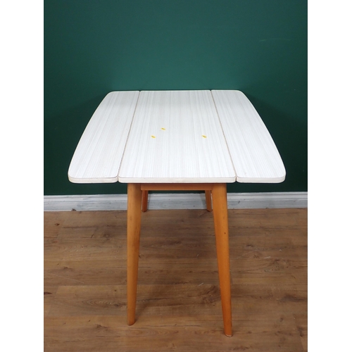 714 - A formica topped drop leaf Kitchen Table 3ft 5in W x 2ft 5in H