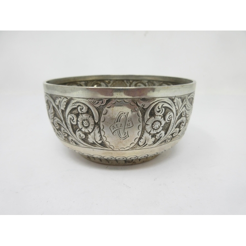 73 - A Victorian silver circular Bowl, embossed birds and leafage scrolls, Birmingham 1886, maker: George... 