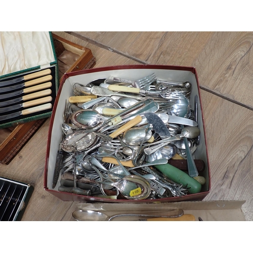 755 - A box of plated Cutlery and a quantity of boxed Cutlery