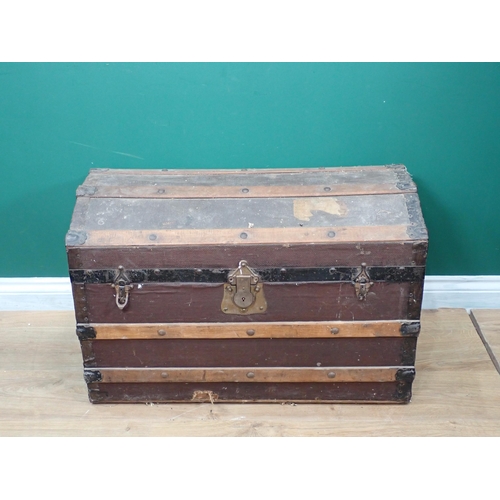 767 - A wooden bound domed trunk, 2ft 6in W