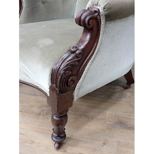 770 - A Victorian button upholstered Armchair on casters