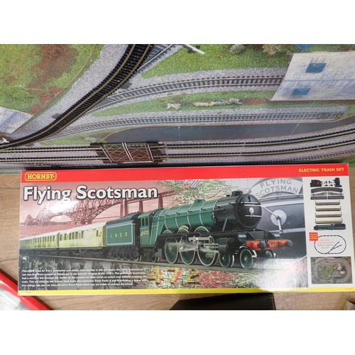 774 - A boxed Hornby OO gauge flying Scotsman set c/w a layout with track, 6ft x 4ft