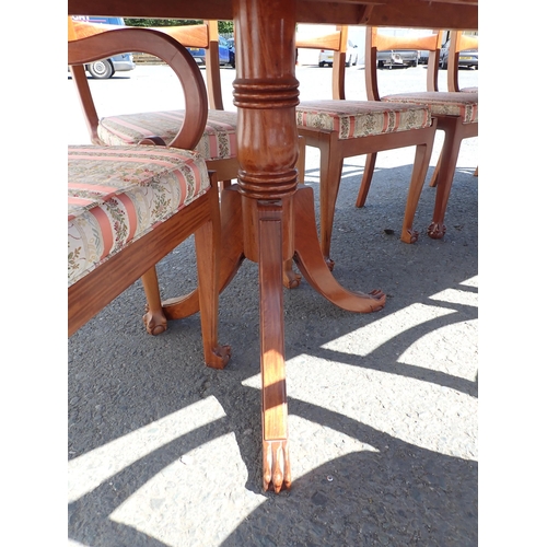 810 - A modern hardwood extending Dining Table with two spare leaves 8ft 4in L x 2ft 6in H and ten Dining ... 