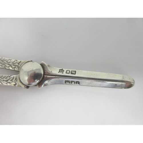 82 - A pair of Edward VII silver Grape Scissors with leafage decoration, London 1901