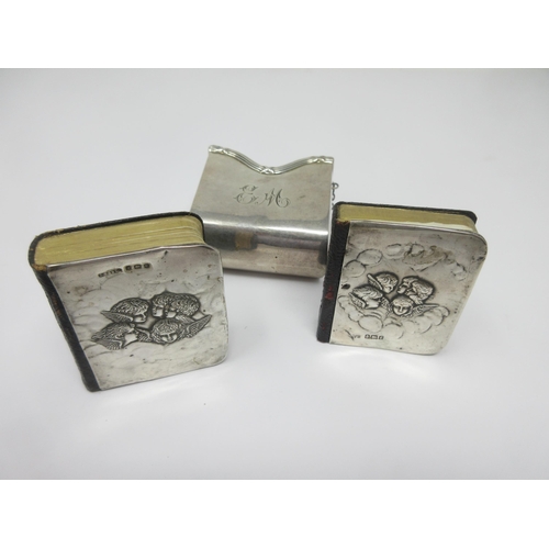 85 - Two Edward VII silver mounted Prayer Books, embossed cherubs, Birmingham 1904/5, in case, engraved i... 