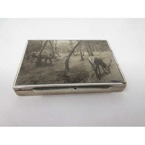 86 - An American silver and enamel Snuff Box, the lid decorated stags in woodland, 3½ x 2½in