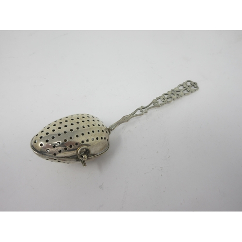 96 - An Edward VII silver Tea Infuser of spoon form with pierced stem, Birmingham 1901