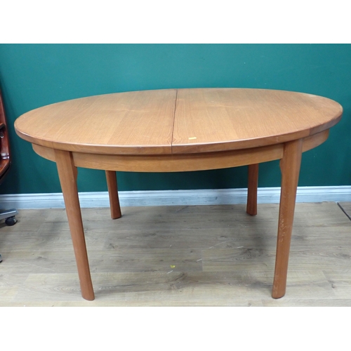 750 - A modern oval extending Dining Table