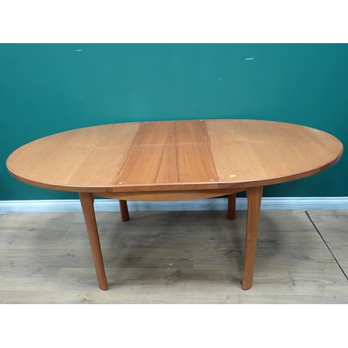 750 - A modern oval extending Dining Table