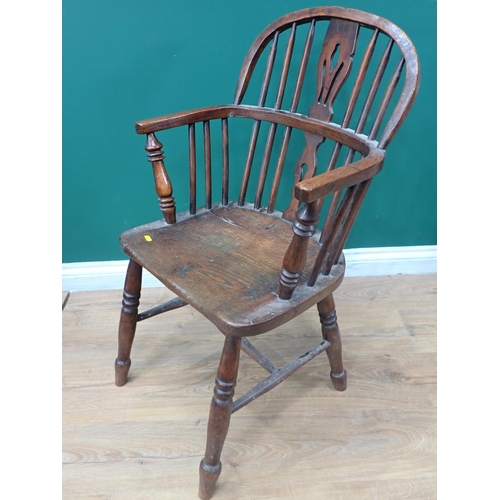 811 - A 19th Century ash Windsor Elbow Chair with pierced splat back on turned supports and H-stretcher 2f... 