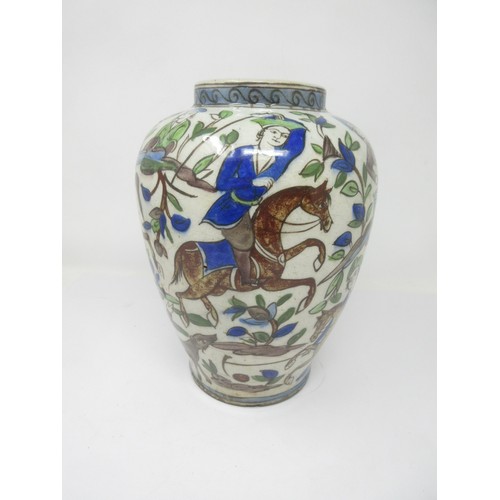 11 - A Persian pottery baluster Vase painted figures hunting on horseback, 10in