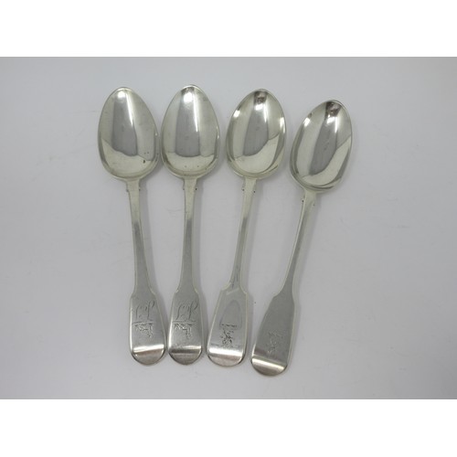 60 - A pair of George III silver Table Spoons, fiddle pattern, engraved crests, London 1815, and another ... 