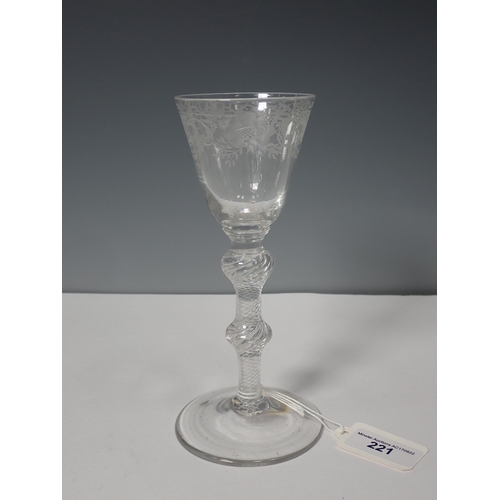 221 - An 18th Century Wine Glass with etched bowl and double knopped air twist stem 6 1/2in H