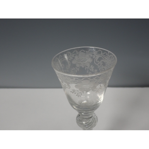 221 - An 18th Century Wine Glass with etched bowl and double knopped air twist stem 6 1/2in H