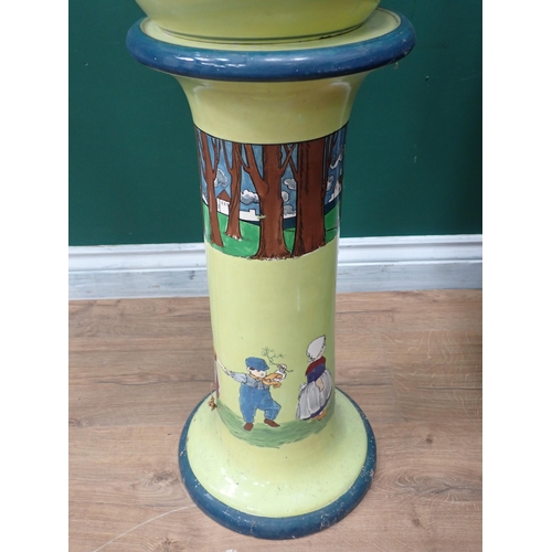 350 - A ceramic Jardiniere on Stand by Wardle and Co. with Dutch scene design A/F