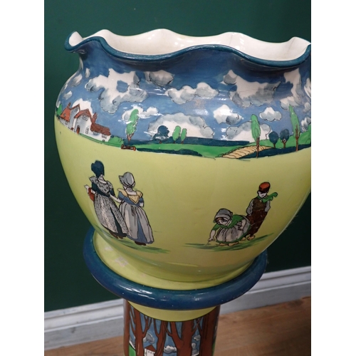 350 - A ceramic Jardiniere on Stand by Wardle and Co. with Dutch scene design A/F