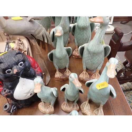 693 - ******WITHDRAWN******

A quantity of pottery models of Ducks and a bone figure of a bird