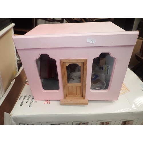 741 - A modern plastic Doll's House with furniture, two boxed wooden Doll's Houses and a small pink painte... 