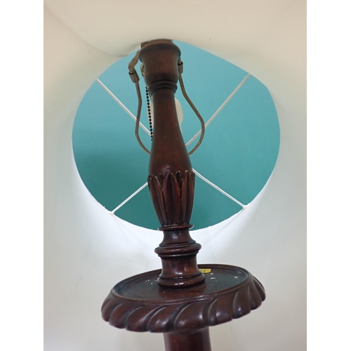 809 - A mahogany Standard Lamp on tripod base with claw feet, failed PAT