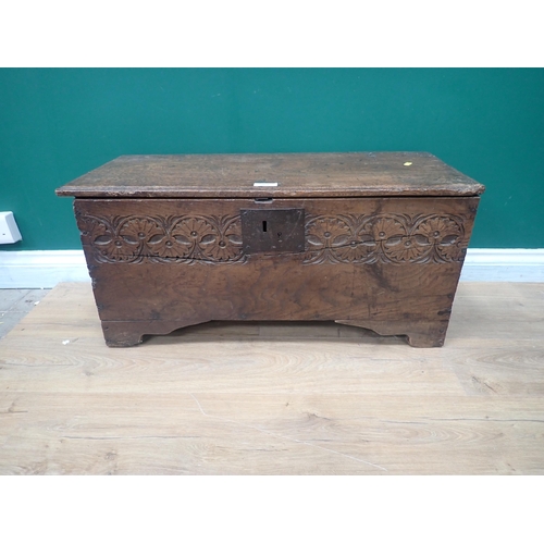 351 - A late 17th/ early 18th Century oak and elm Plank Chest with leafage carved frieze 2ft 9in W x 1ft 3... 