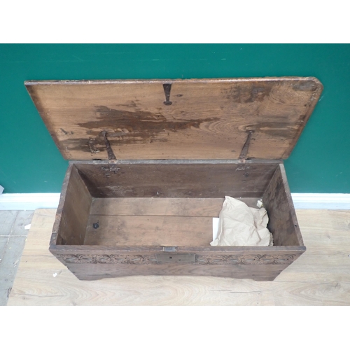 351 - A late 17th/ early 18th Century oak and elm Plank Chest with leafage carved frieze 2ft 9in W x 1ft 3... 