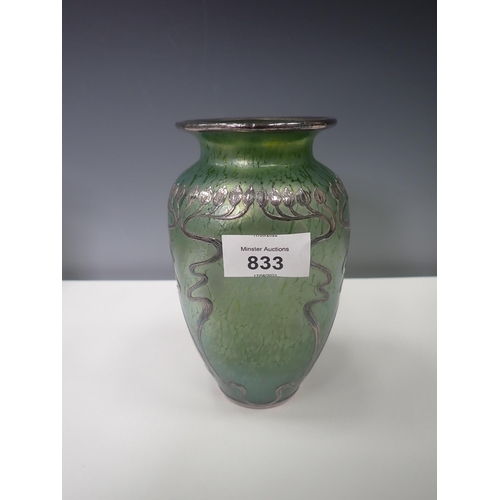 833 - A green iridescent glass Vase with silver overlaid floral design