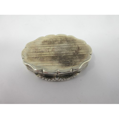 131 - A Victorian silver shaped oval Snuff Box with scallop edge punched initials, Birmingham 1851, maker:... 