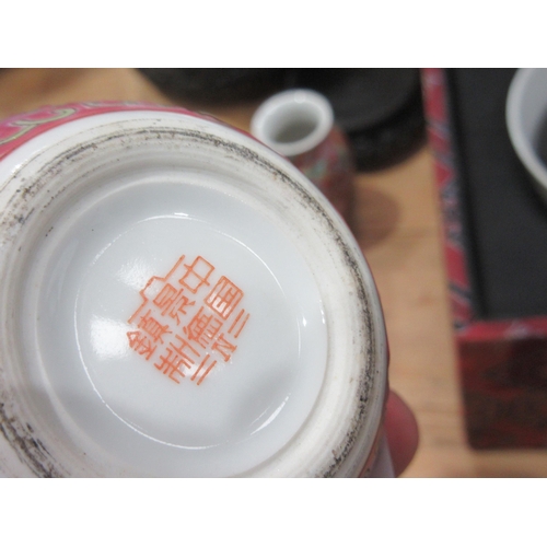 615 - A Chinese ceramic stacking Jar, a Chinese Vase on stand, pair of Bowls on stands, pair of small squa... 