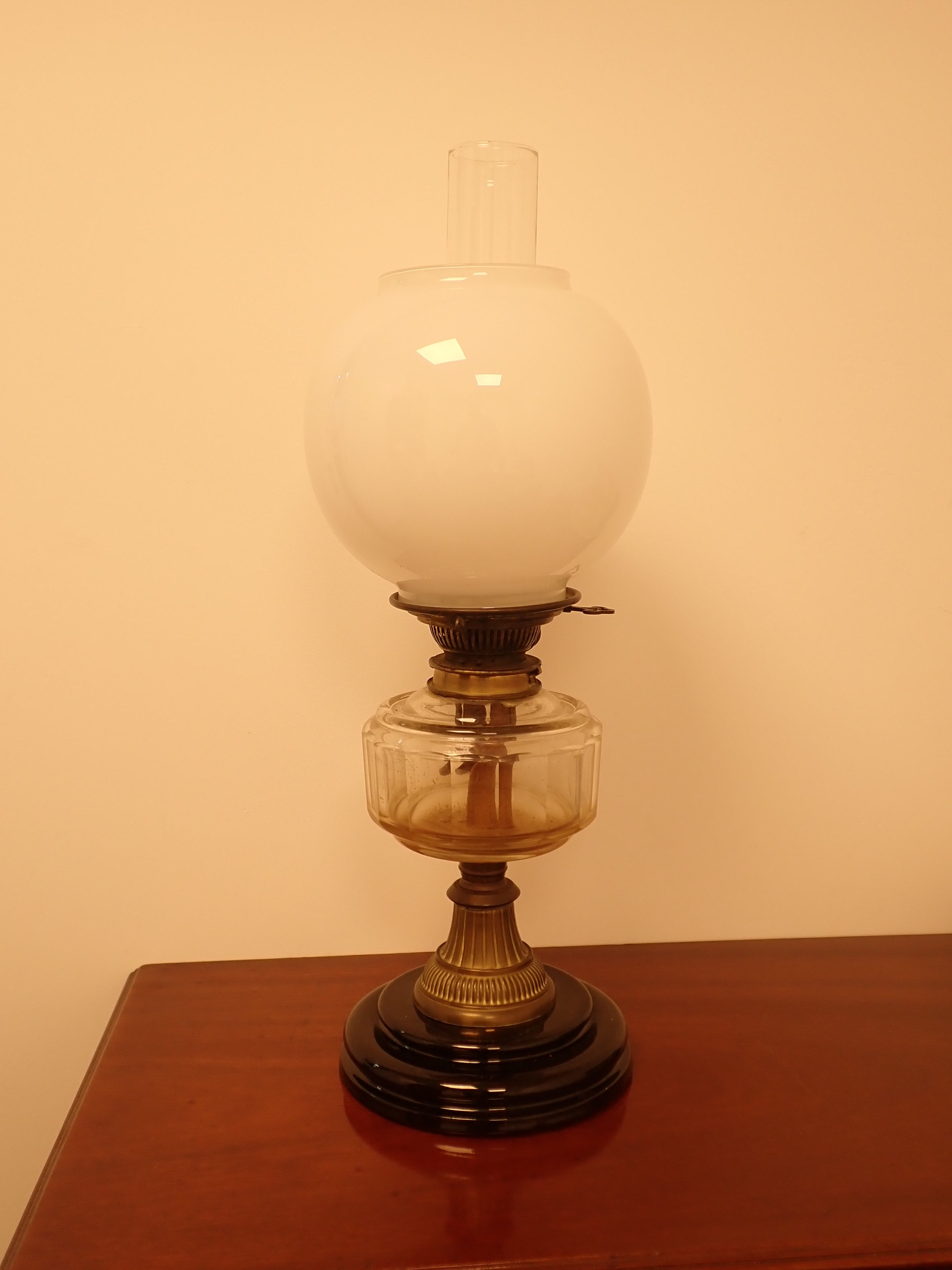 A Victorian Hink's & Sons brass Oil Lamp with facetted clear glass