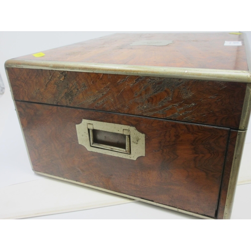 100 - A Victorian burr oak Travelling Dressing Case, the hinged lid with inset shield cartouche enclosing ... 