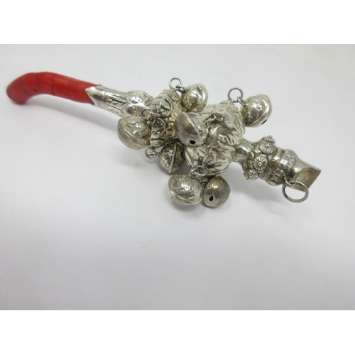 111 - A Continental silver Rattle with whistle and ten bells