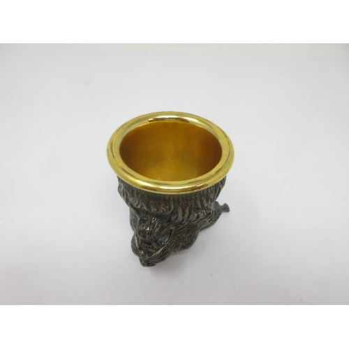 124 - A white metal and gilt lynx head Stirrup Cup