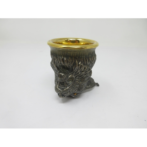 124 - A white metal and gilt lynx head Stirrup Cup