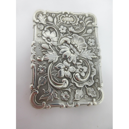 134 - A 19th Century silver Card Case with scene of 'Battle Abbey, Sussex', titled pineapple and floral de... 