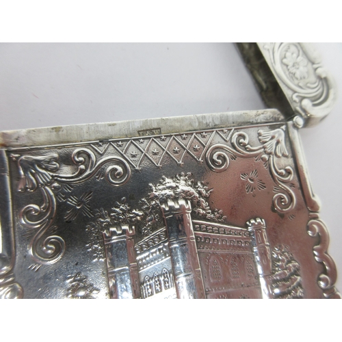 134 - A 19th Century silver Card Case with scene of 'Battle Abbey, Sussex', titled pineapple and floral de... 