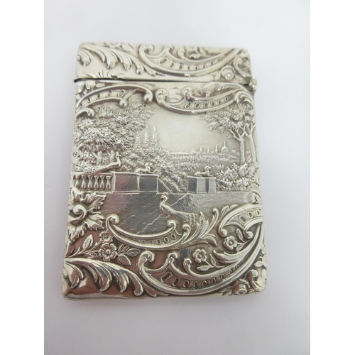 135 - An Edward VII silver Card Case with mandolin player and peacock in formal landscape, Birmingham 1905... 