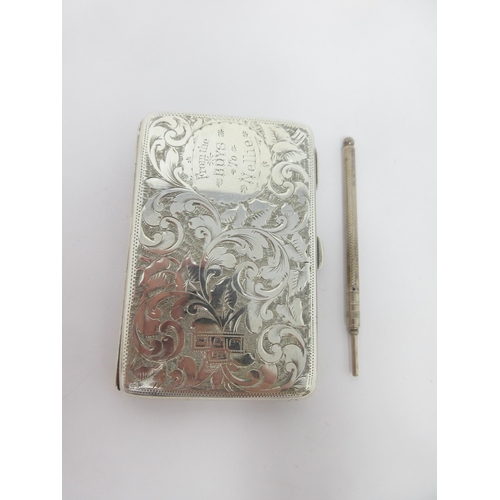 137 - A Victorian silver Card Case with floral and leafage scroll engraving, circular cartouche 'From the ... 