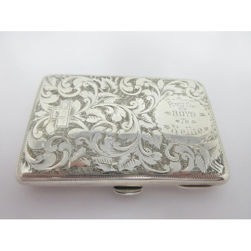 137 - A Victorian silver Card Case with floral and leafage scroll engraving, circular cartouche 'From the ... 