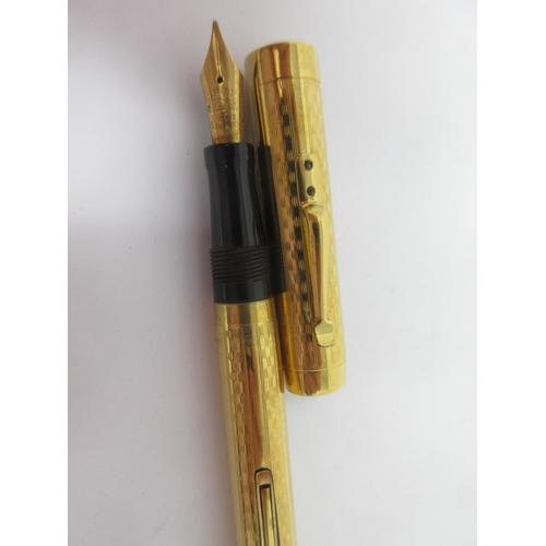 147 - A Spot Fountain Pen with 14ct nib and gold plated case, and a Propelling Pencil with rolled gold cas... 