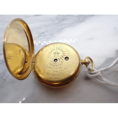 153 - An 18ct gold cased open faced key wind Pocket Watch the floral engraved dial with roman numerals, pl... 