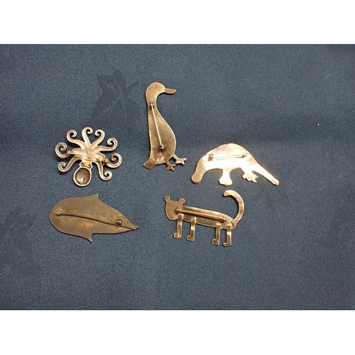 167 - A modern silver stylised Cat Brooch, two other silver Brooches and two white metal Brooches