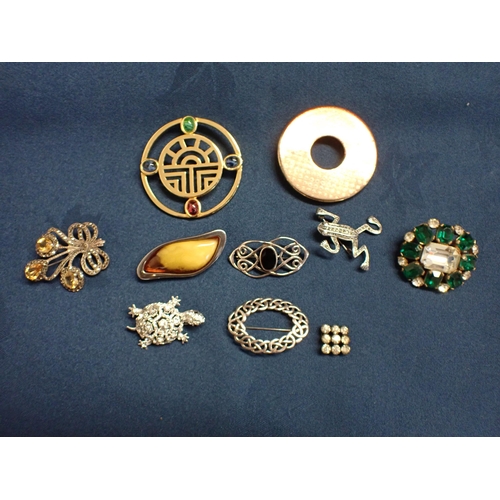 180 - A collection of ten various costume Brooches