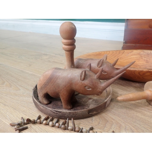 22 - A Victorian walnut Tea Caddy A/F, two Letter Racks, a treen Bowl, Rolling Pin, carved Rhino, model T... 