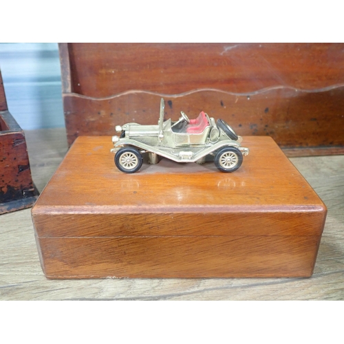 22 - A Victorian walnut Tea Caddy A/F, two Letter Racks, a treen Bowl, Rolling Pin, carved Rhino, model T... 