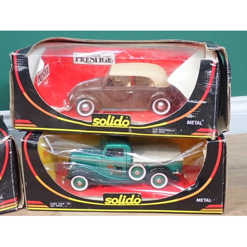 25 - Three boxed Solido Prestige 1:18 scale diecast Vehicles and a boxed Burago 1:18 Dodge Viper