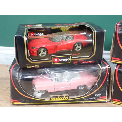 25 - Three boxed Solido Prestige 1:18 scale diecast Vehicles and a boxed Burago 1:18 Dodge Viper