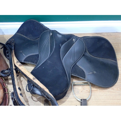 267 - Two old leather Saddles, a pair of Hames and a quantity of Tack