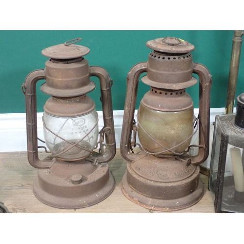 274 - A box of Oil Lamps, Lanterns, brass Table Lamp, cooking Pot and a large Kettle