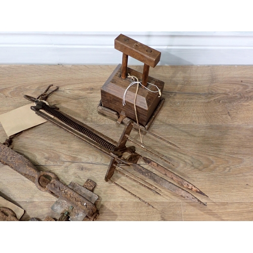 278 - Three antique Gin Traps, a wooden Mousetrap and a Mole Trap